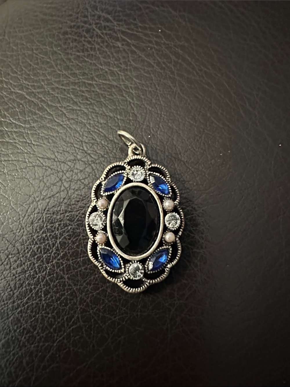 Vintage-Style Silver Pendant with Black and Blue Stones